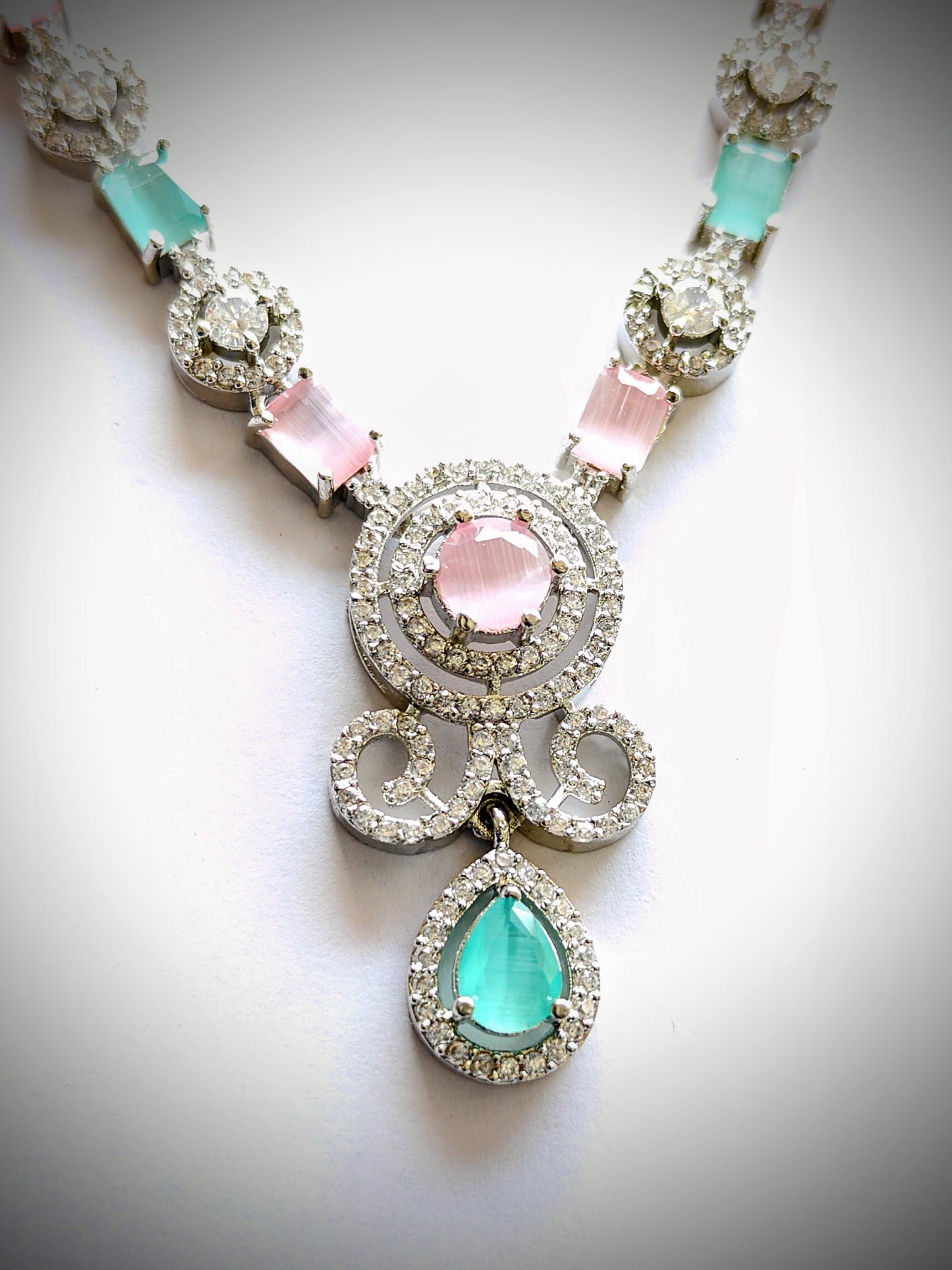 Contemporary Dual-Tone Rhodium Plated CZ Pendant Set with Mint & Blush Drops